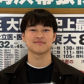 津野智典