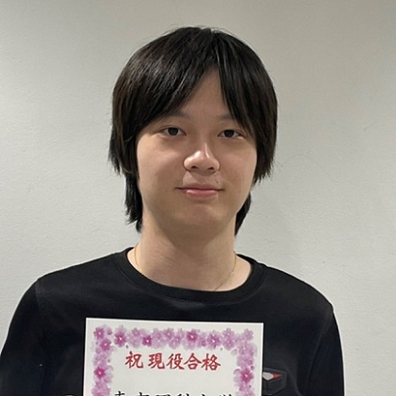 張タクカ